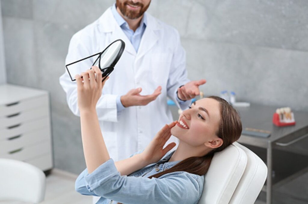A women is undergoing dental treatment in St. Charles, MO